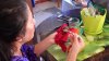 Baby on table eating papaya 3 resized.jpg